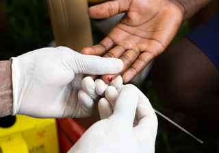 Finger prick test HIV. Credit: Adam Jan Figel / Shutterstock