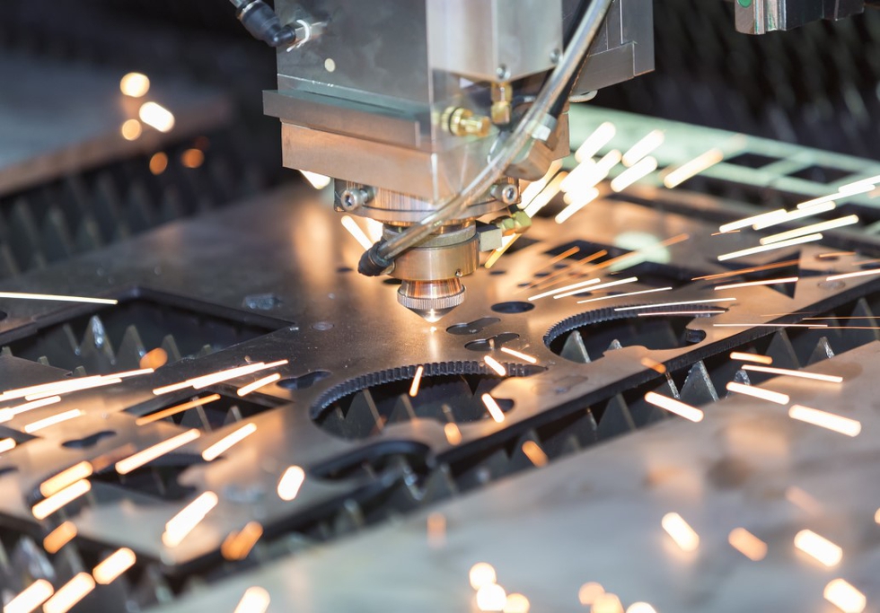 High precision CNC gas cutting metal sheet. Credit: Aumm graphixphoto/Shutterstock