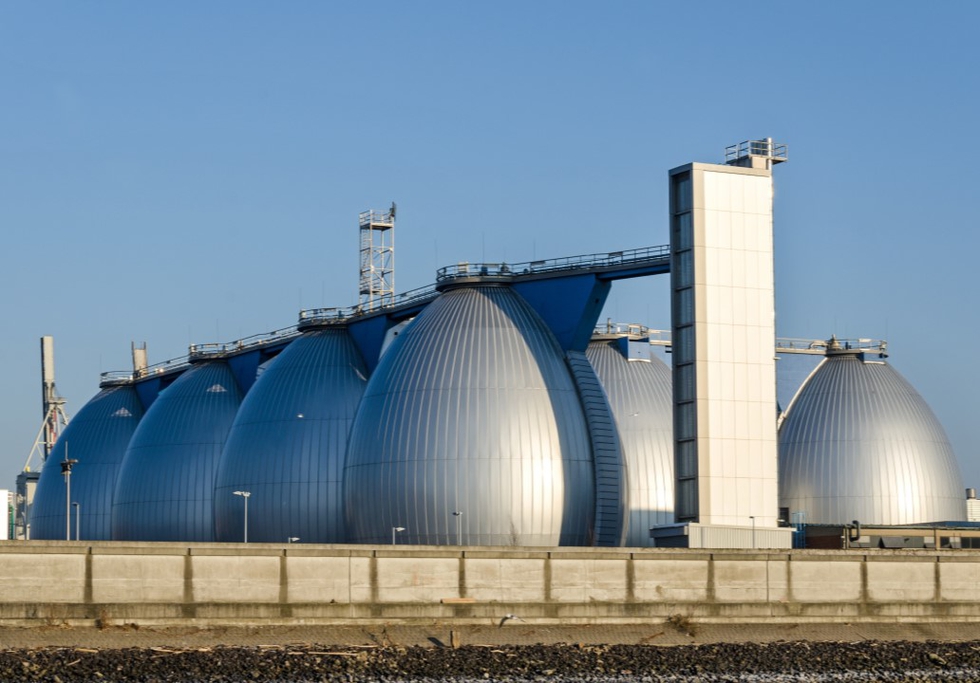 Gas storage tanks in the harbour area in Hamburg, Germany. Credit: calado / Shutterstock