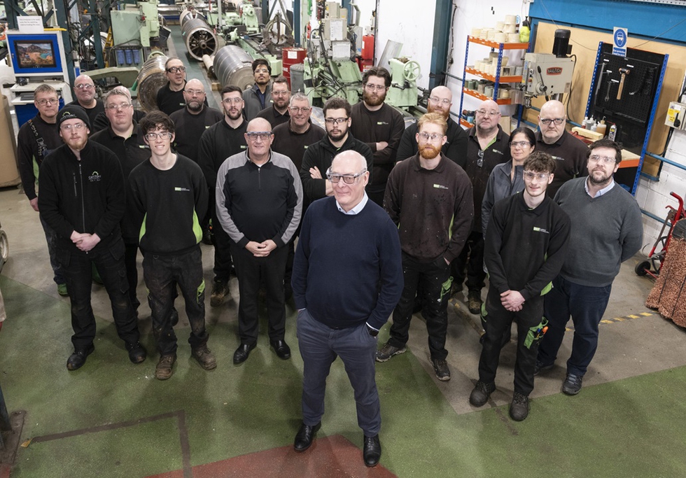 Andrew McClusky, Managing Director @ BEP Surface Technologies at the forefront with factory staff.jpg